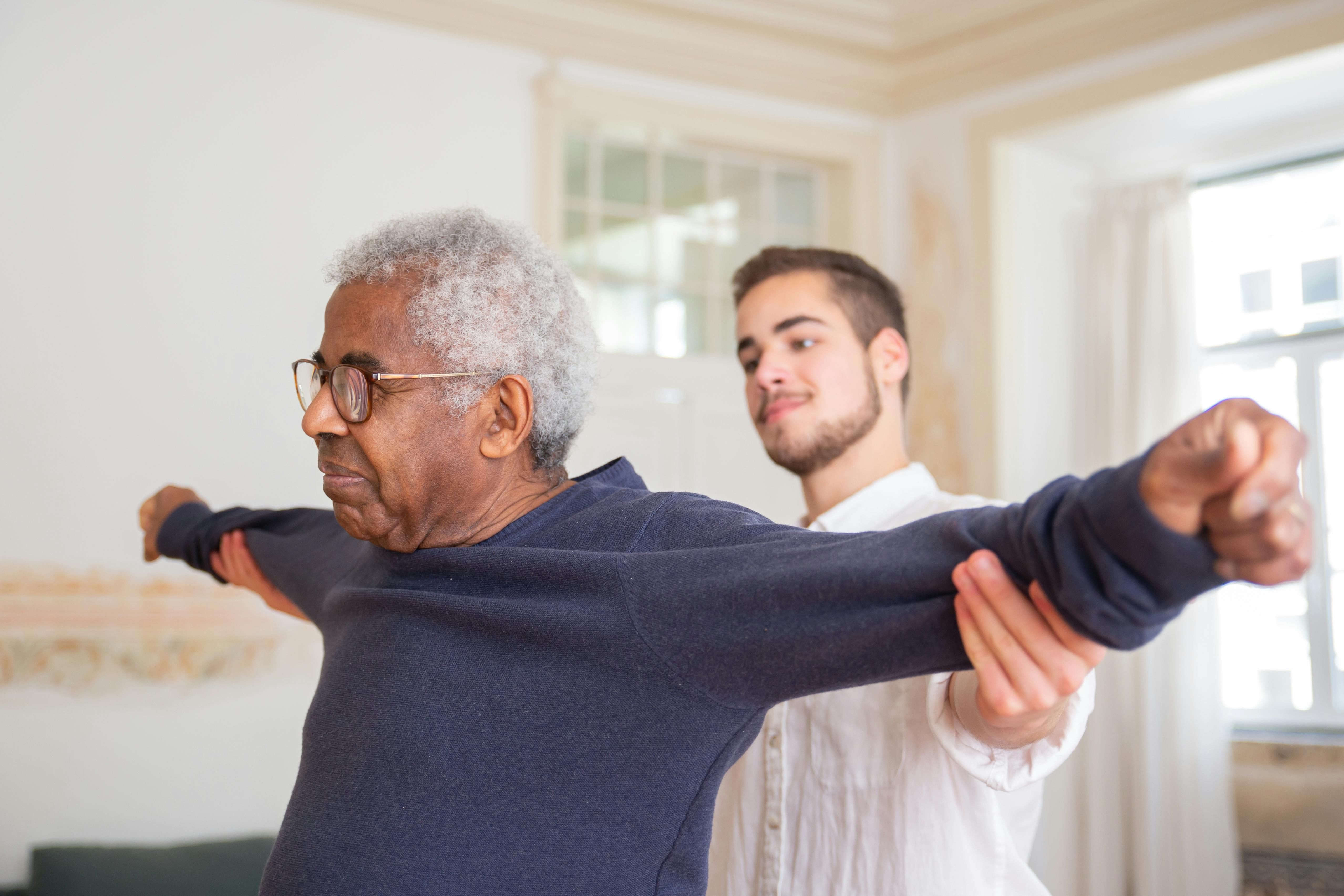Resident in physical therapy session at The Waters of New Castle